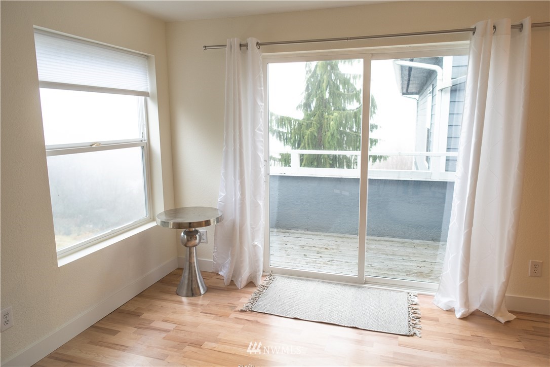 3733 Waller Road East, Unit 301 Tacoma, WA 98443 - Photo 6 of 17 a view of an empty room and a window