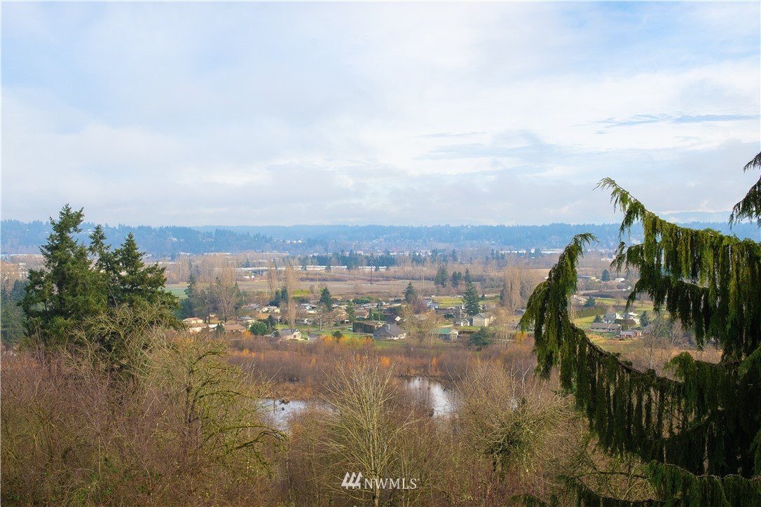 3733 Waller Road East, Unit 301 Tacoma, WA 98443 - Photo 8 of 17 a view of a lake in middle of the town