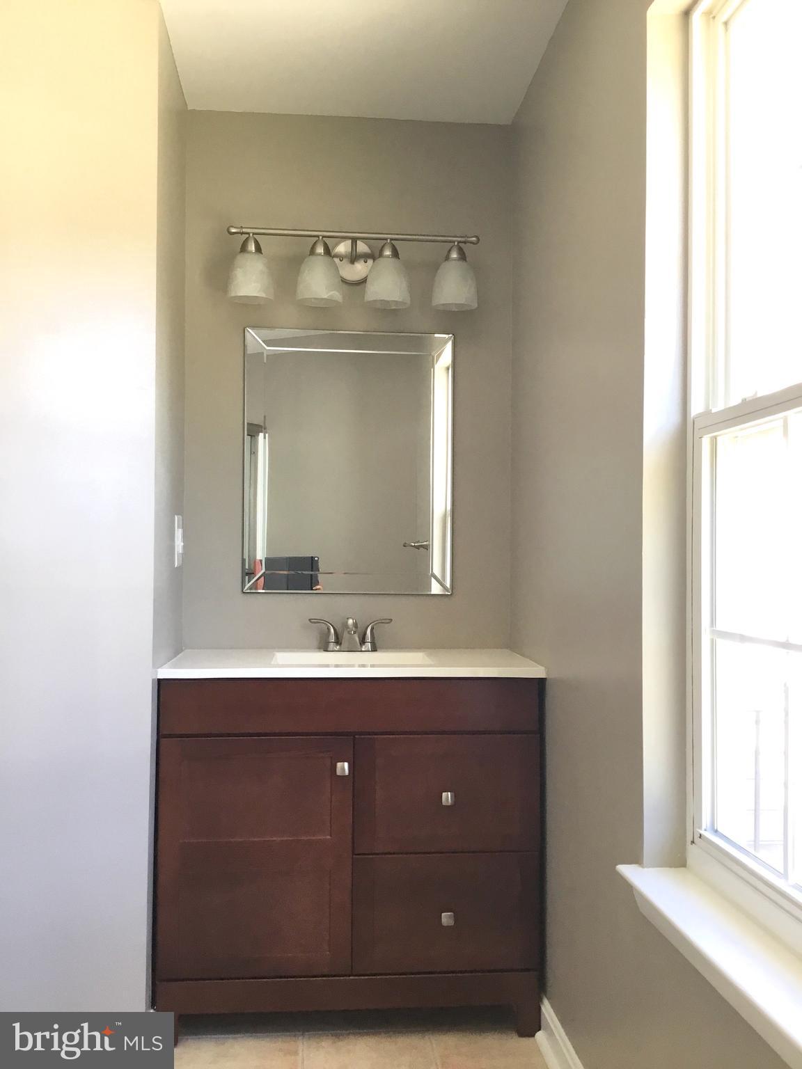 4711 Powder Mill Road Beltsville, MD 20705 - Photo 23 of 32 Bathroom