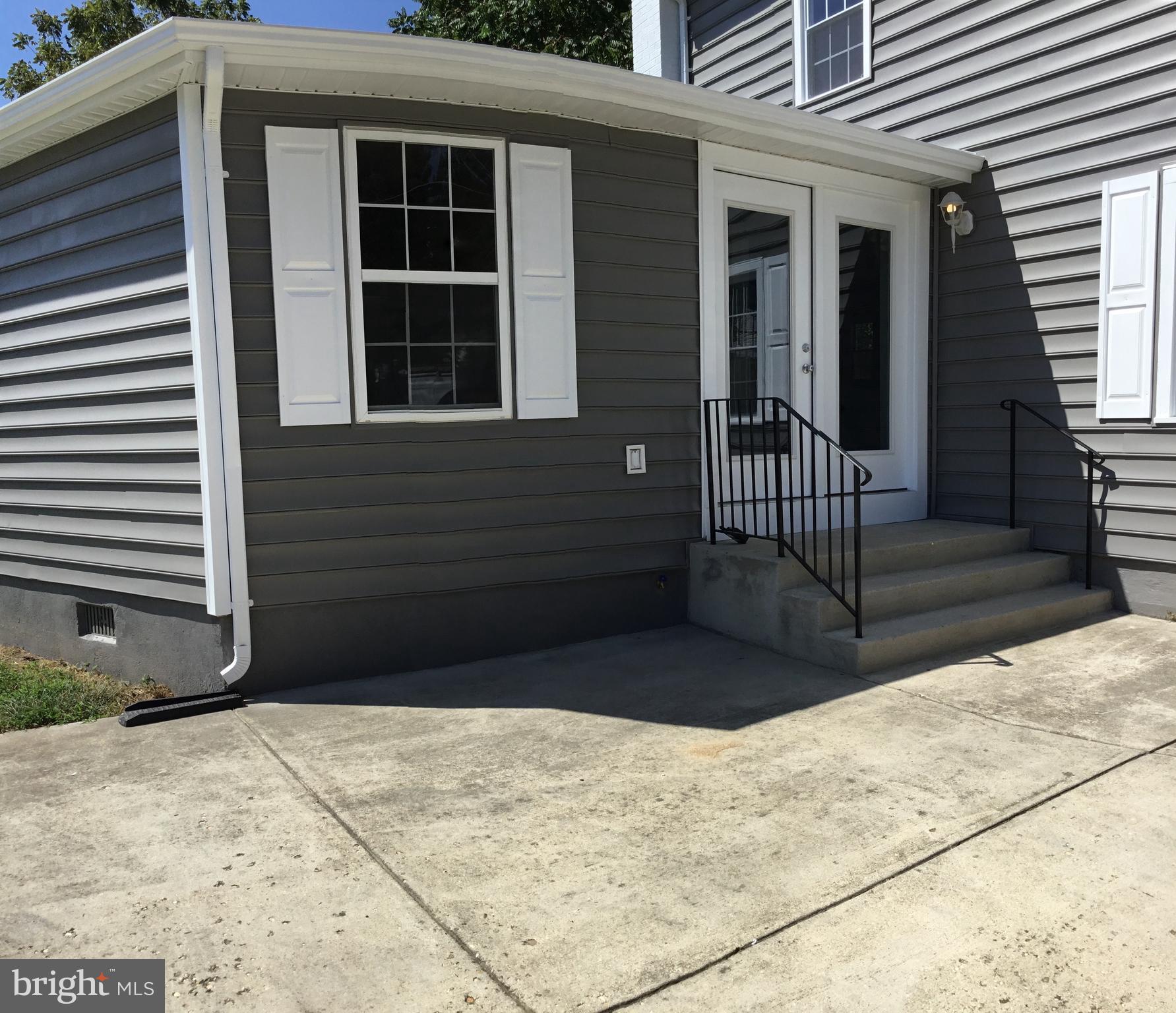 4711 Powder Mill Road Beltsville, MD 20705 - Photo 4 of 32 Exterior view Lateral door
