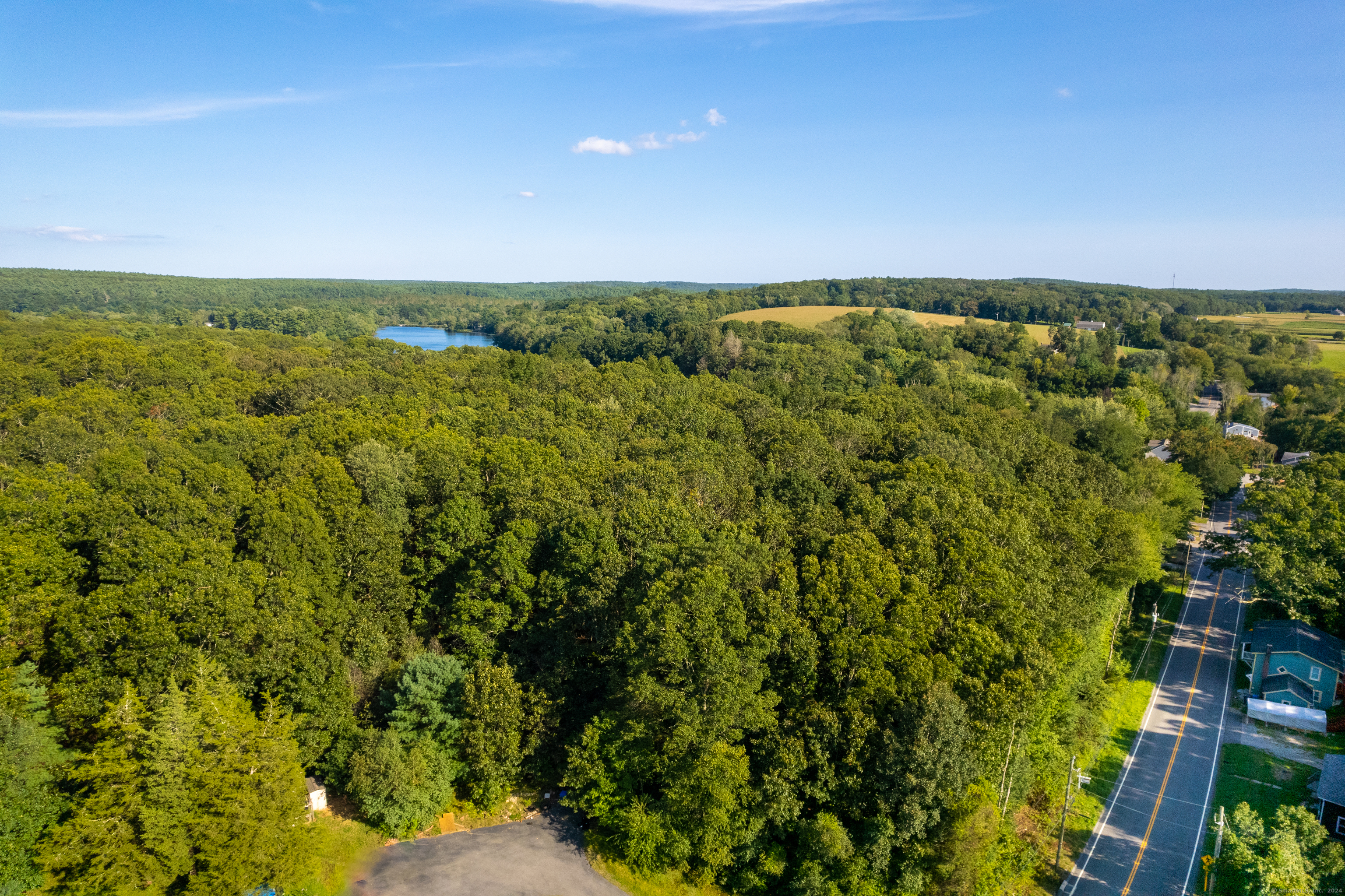 1832 Glasgo Road Griswold, CT 06351 - Photo 4 of 4 a view of a field with an ocean