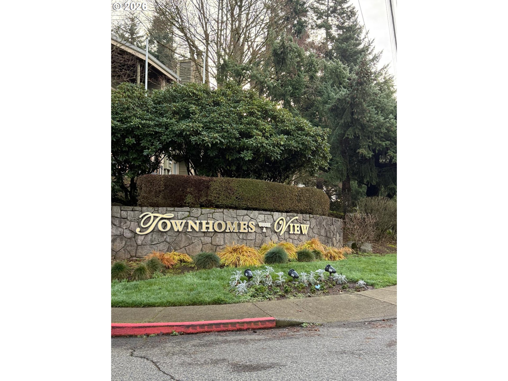 9987 Southeast Talbert Street Clackamas, OR 97015 - Photo 2 of 14 a view of a yard with potted plants