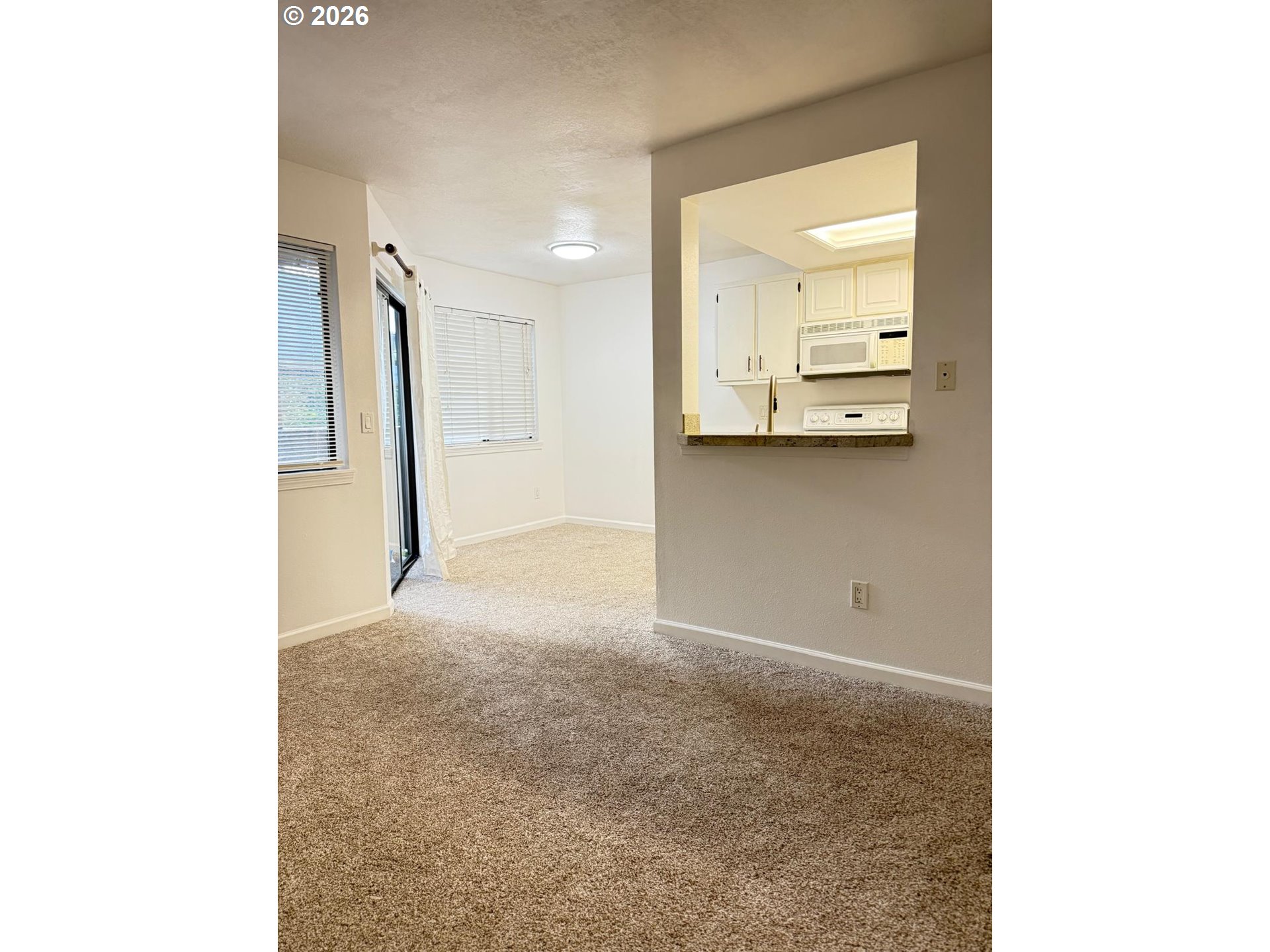9987 Southeast Talbert Street Clackamas, OR 97015 - Photo 6 of 14 a view of a hallway