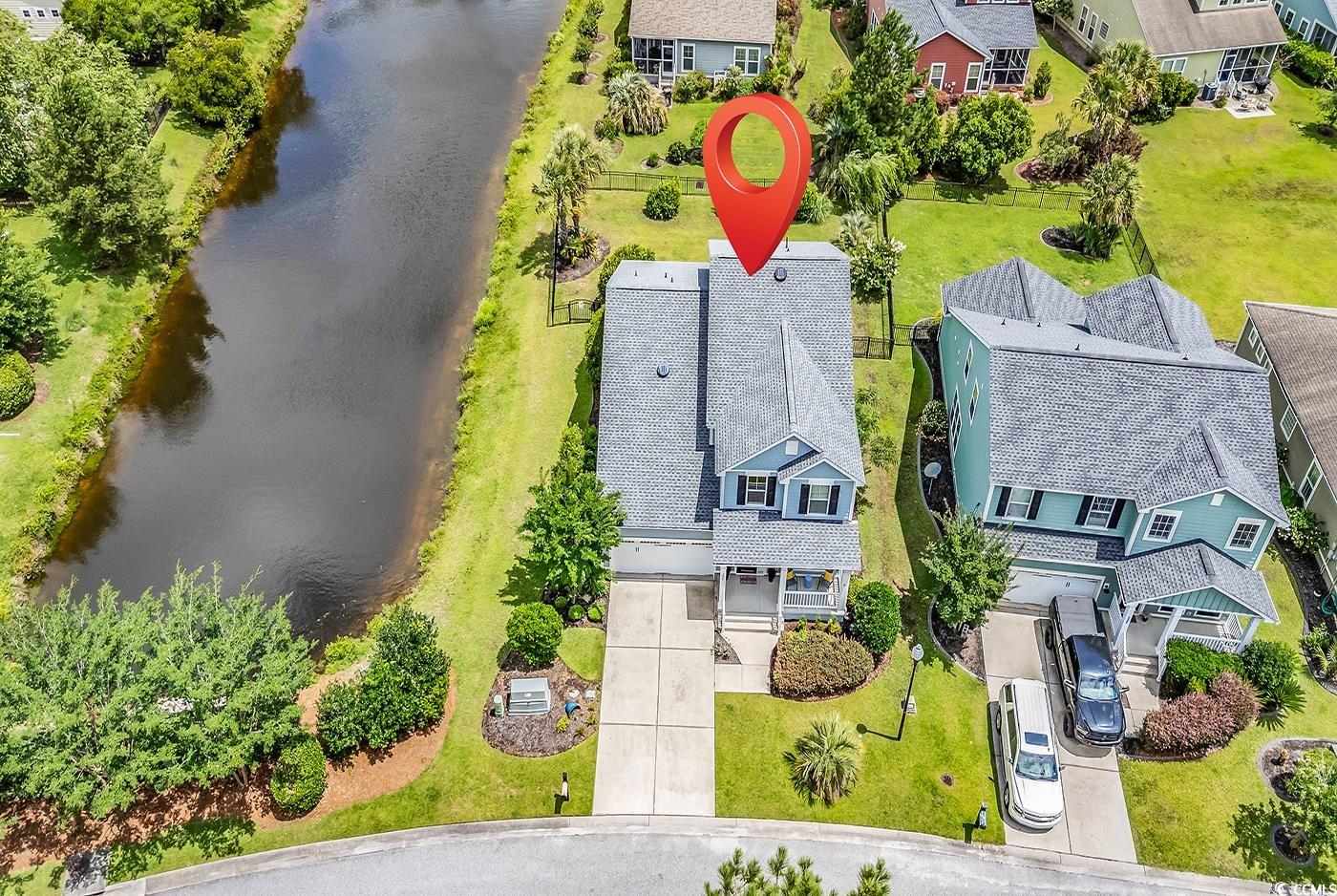 126 Dreamland Drive Murrells Inlet, SC 29576 - Photo 2 of 40 Aerial view of residential area featuring a nearby body of water