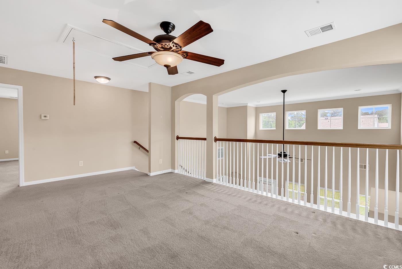 126 Dreamland Drive Murrells Inlet, SC 29576 - Photo 22 of 40 Carpeted empty room with attic access, ceiling fan, and baseboards