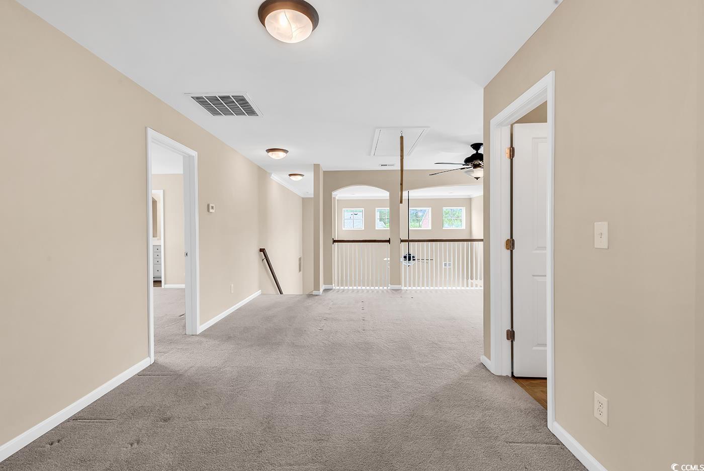 126 Dreamland Drive Murrells Inlet, SC 29576 - Photo 27 of 40 Hall featuring attic access, carpet floors, an upstairs landing, and baseboards