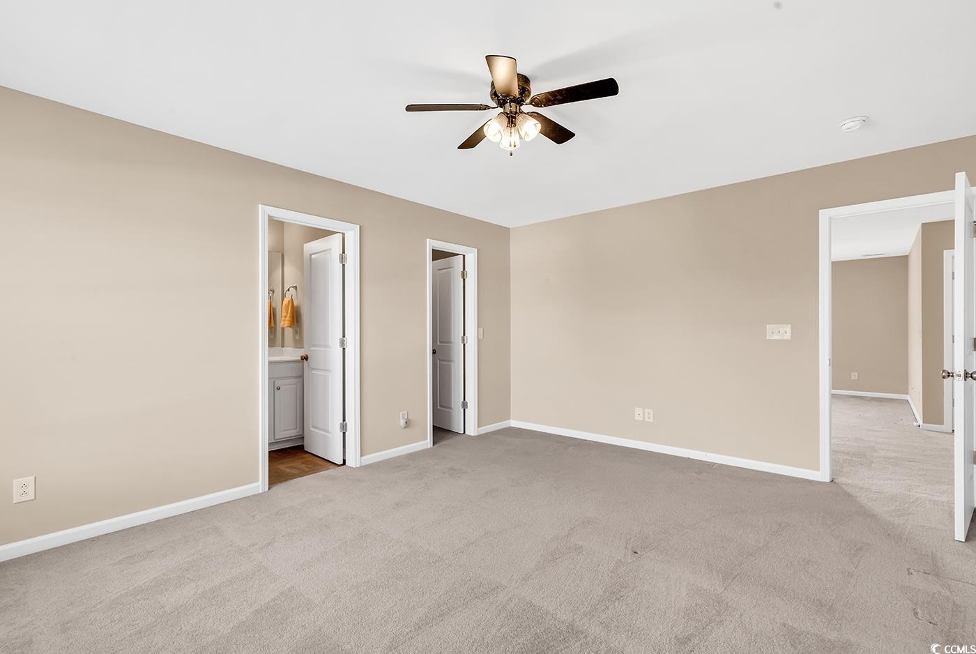126 Dreamland Drive Murrells Inlet, SC 29576 - Photo 28 of 40 Unfurnished bedroom featuring carpet, baseboards, and connected bathroom