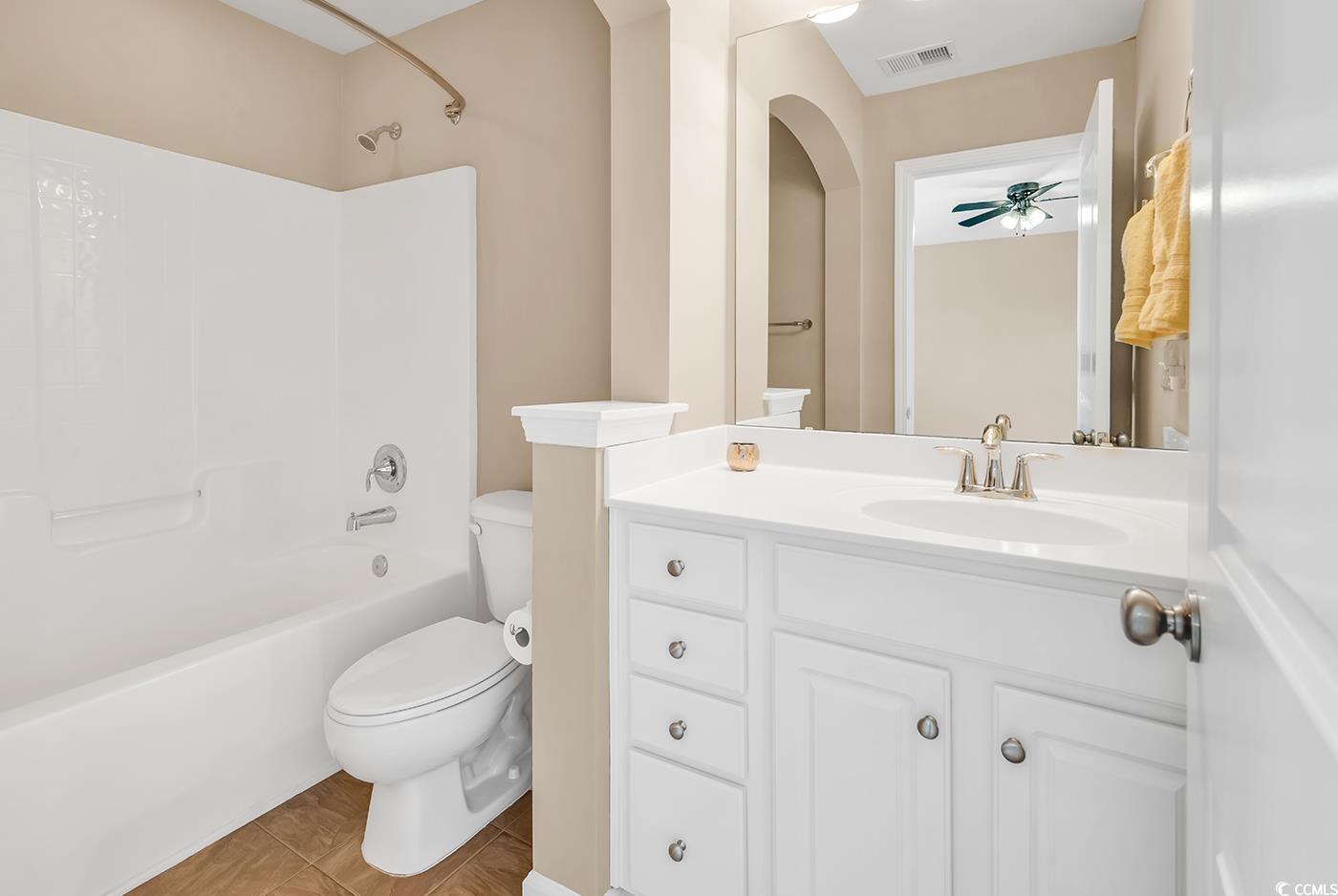 126 Dreamland Drive Murrells Inlet, SC 29576 - Photo 29 of 40 Full bath featuring toilet, shower / washtub combination, vanity, and a ceiling fan
