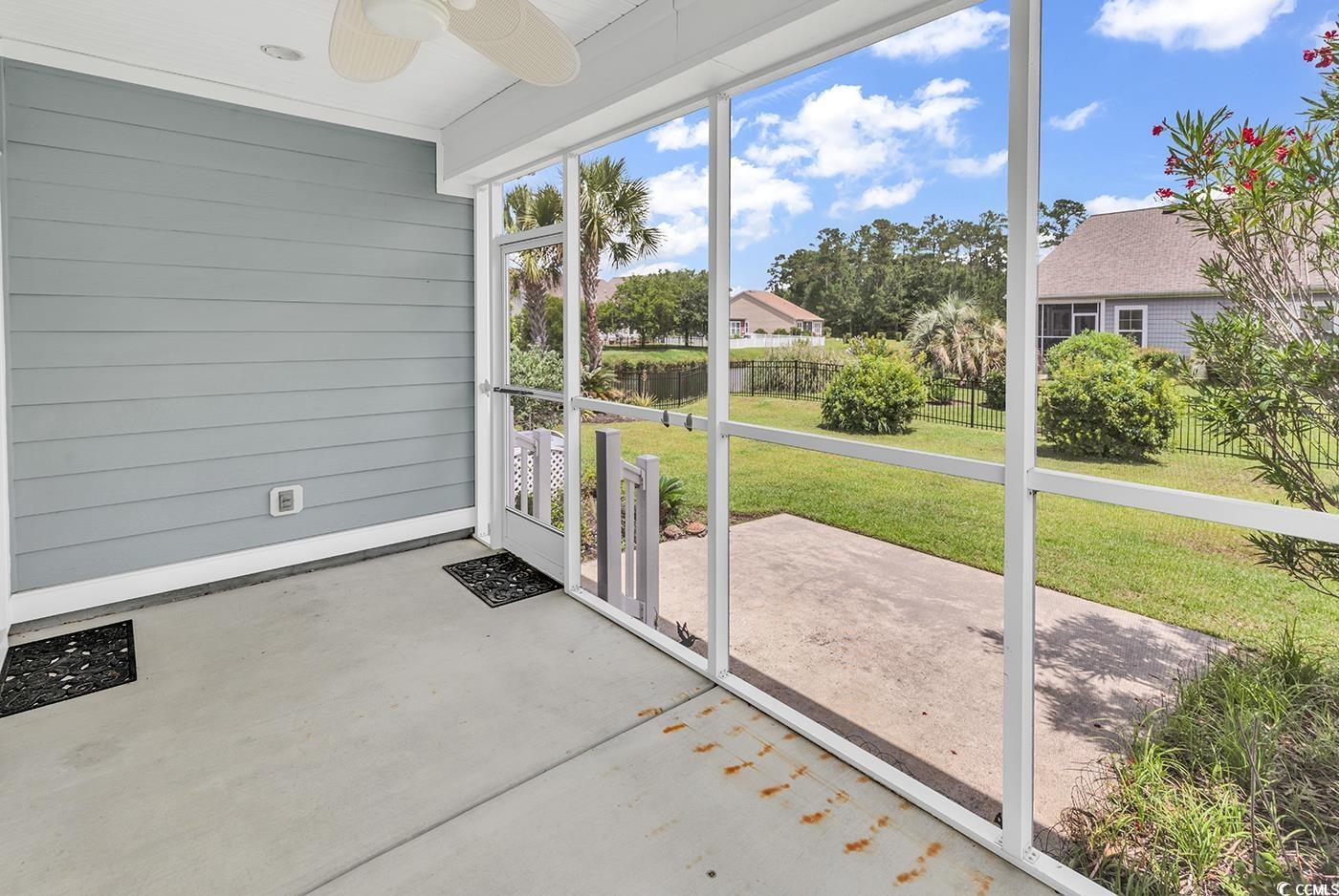 126 Dreamland Drive Murrells Inlet, SC 29576 - Photo 30 of 40 Unfurnished sunroom featuring ceiling fan
