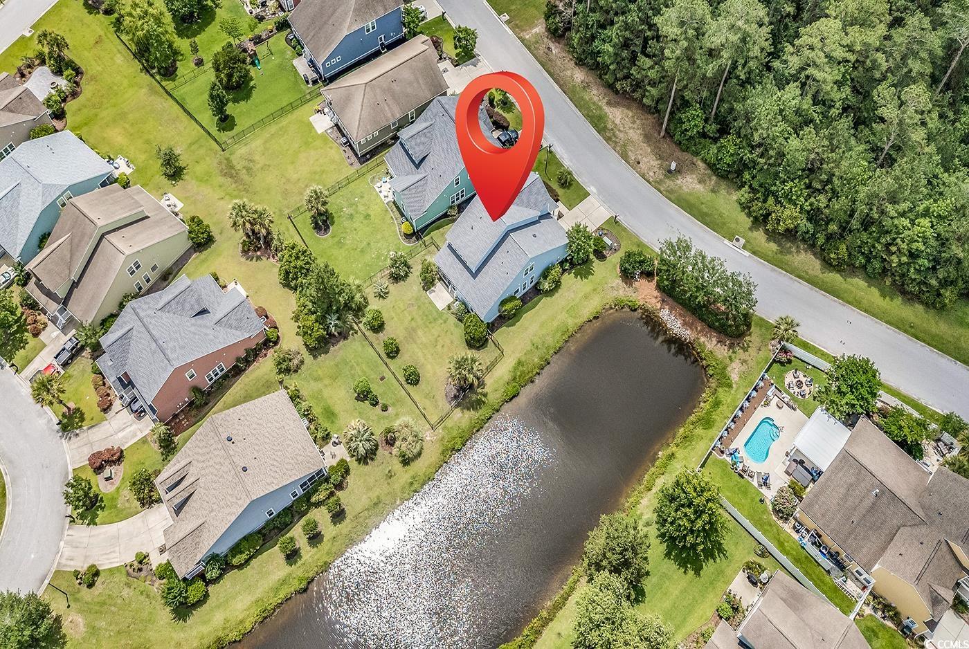 126 Dreamland Drive Murrells Inlet, SC 29576 - Photo 37 of 40 Aerial perspective of suburban area with a nearby body of water