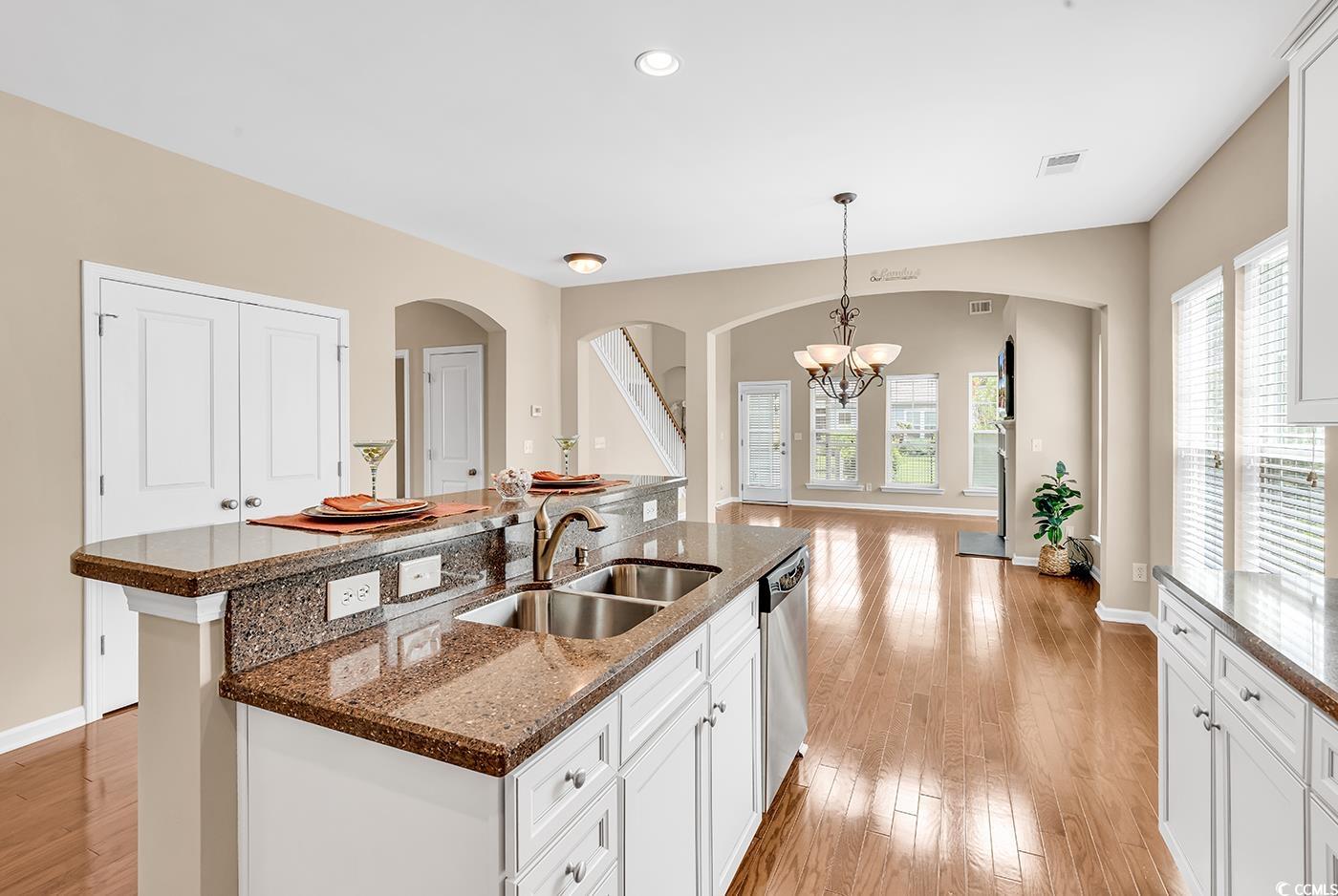 126 Dreamland Drive Murrells Inlet, SC 29576 - Photo 5 of 40 Kitchen with a sink, dishwasher, a center island with sink, light wood-style flooring, and recessed lighting
