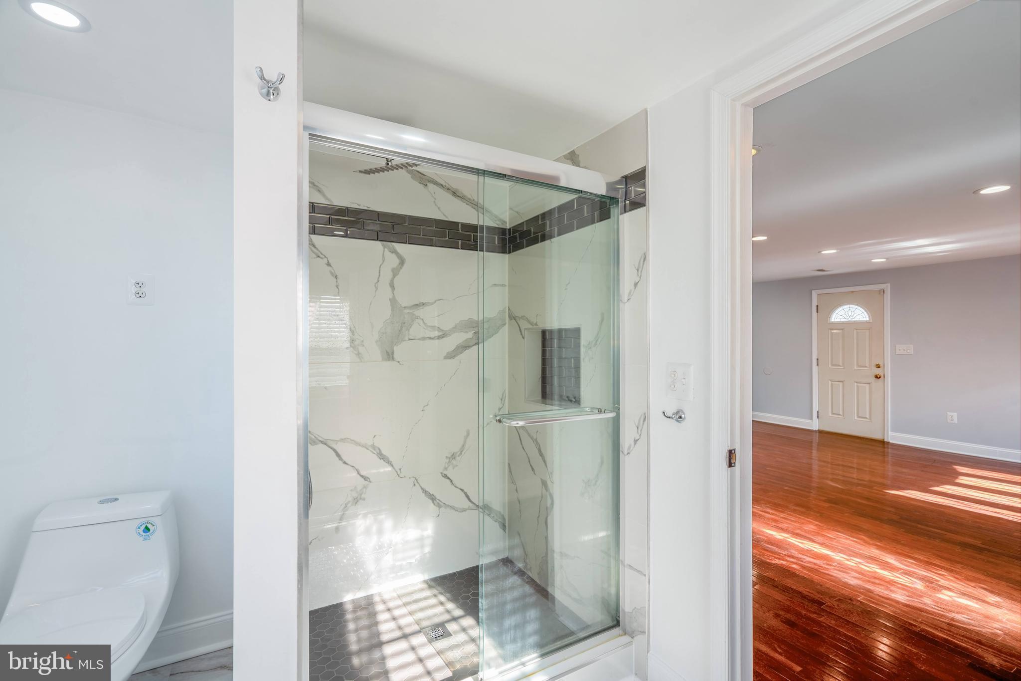 104 Ridge Avenue Baltimore, MD 21227 - Photo 17 of 49 First bathroom with Luxury showerhead