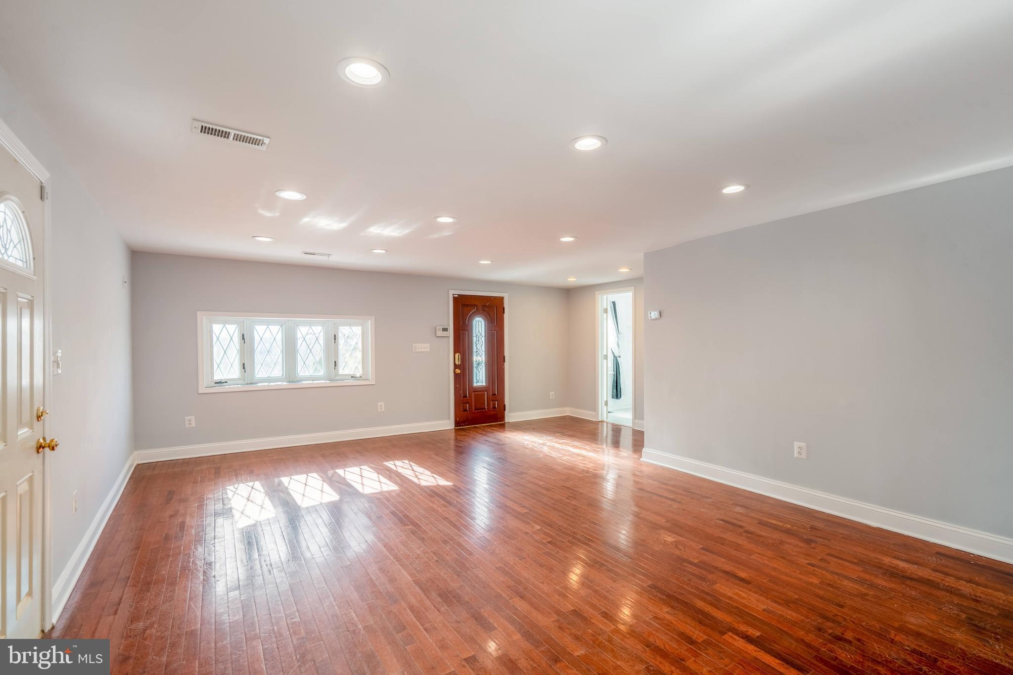 104 Ridge Avenue Baltimore, MD 21227 - Photo 23 of 49 Beautiful hardwood floors and Bay window