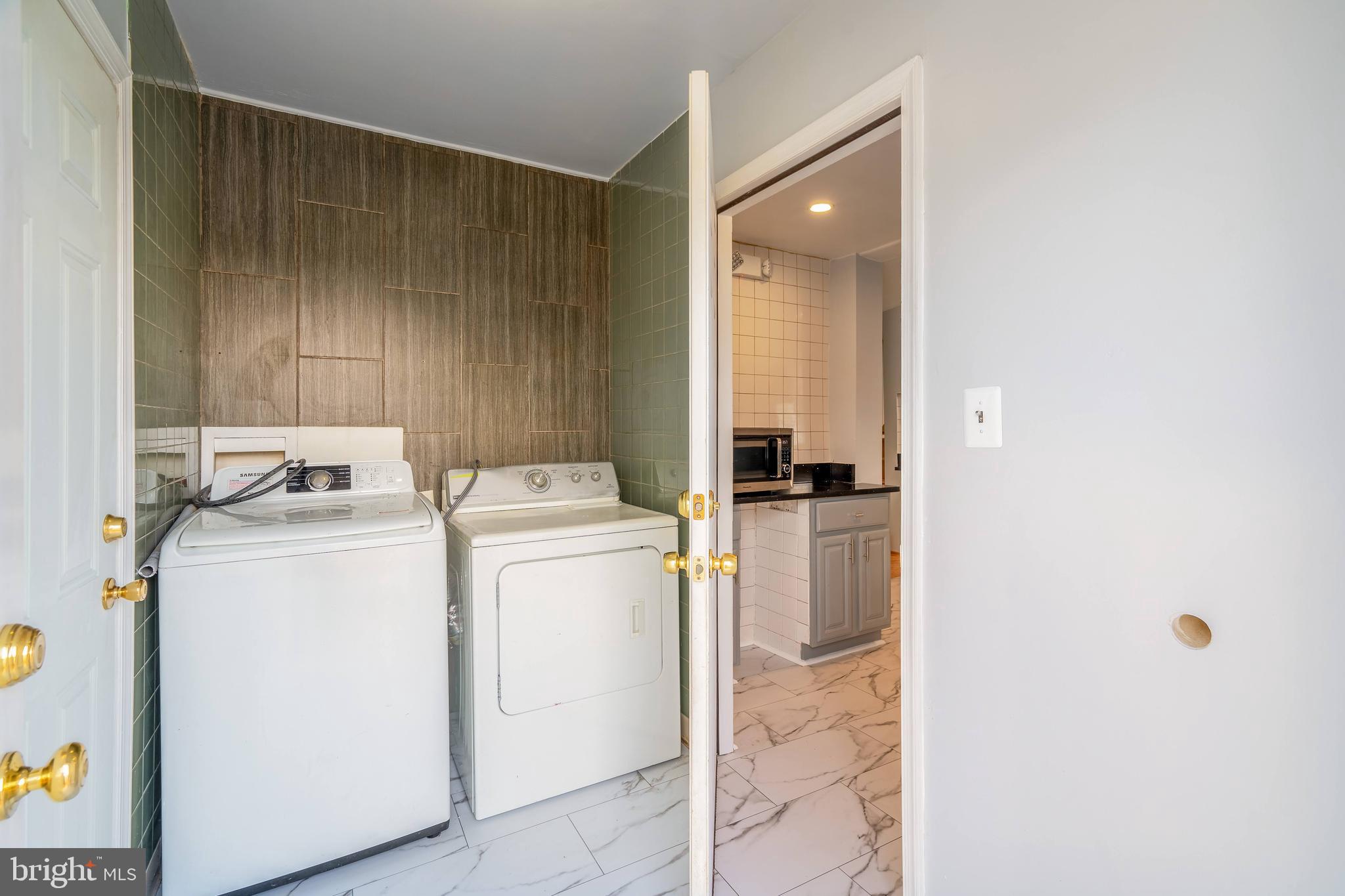 104 Ridge Avenue Baltimore, MD 21227 - Photo 6 of 49 Laundry Room in Mud Room