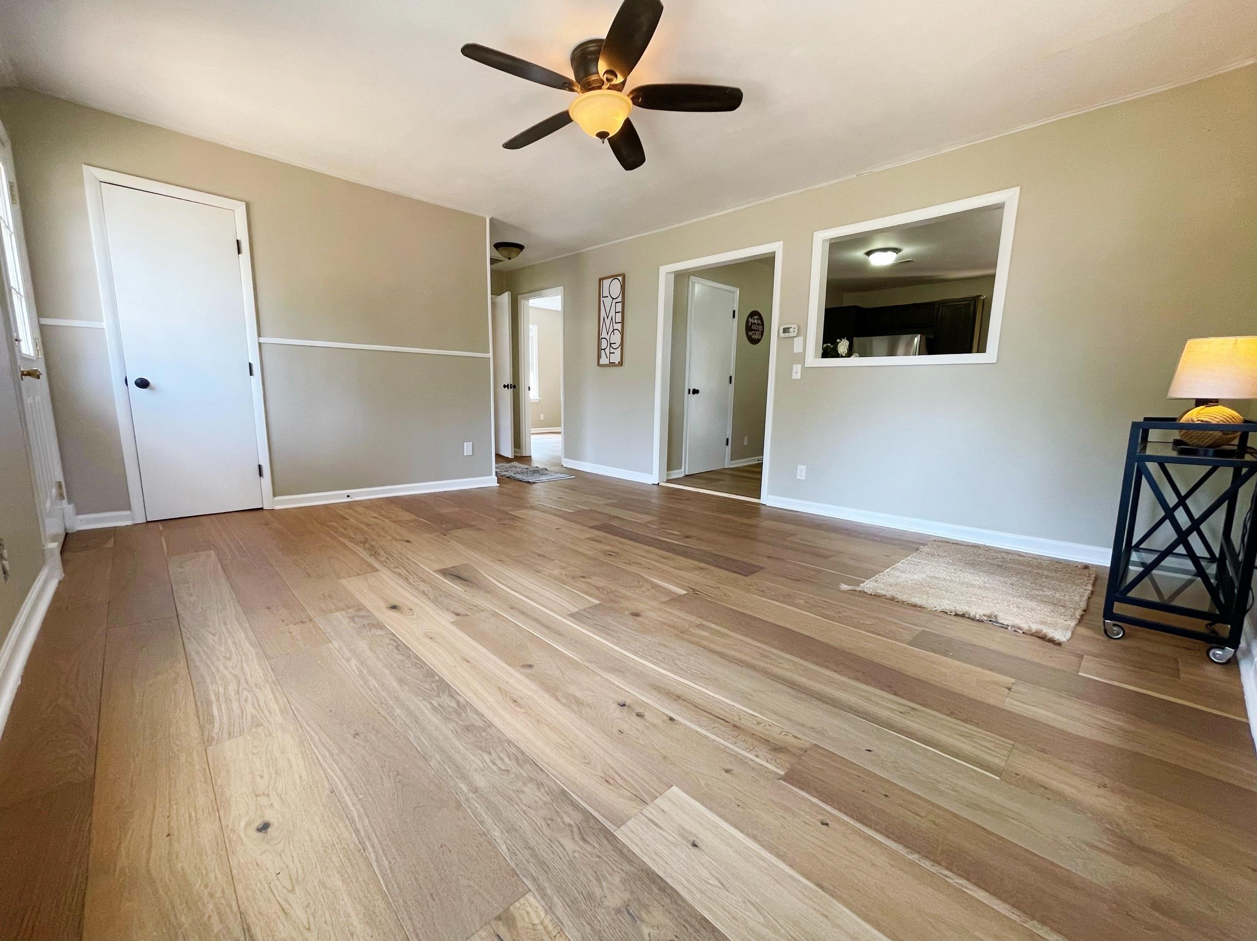503 5th Street Grottoes, VA 24441 - Photo 11 of 24 wooden floor in an empty room with a window
