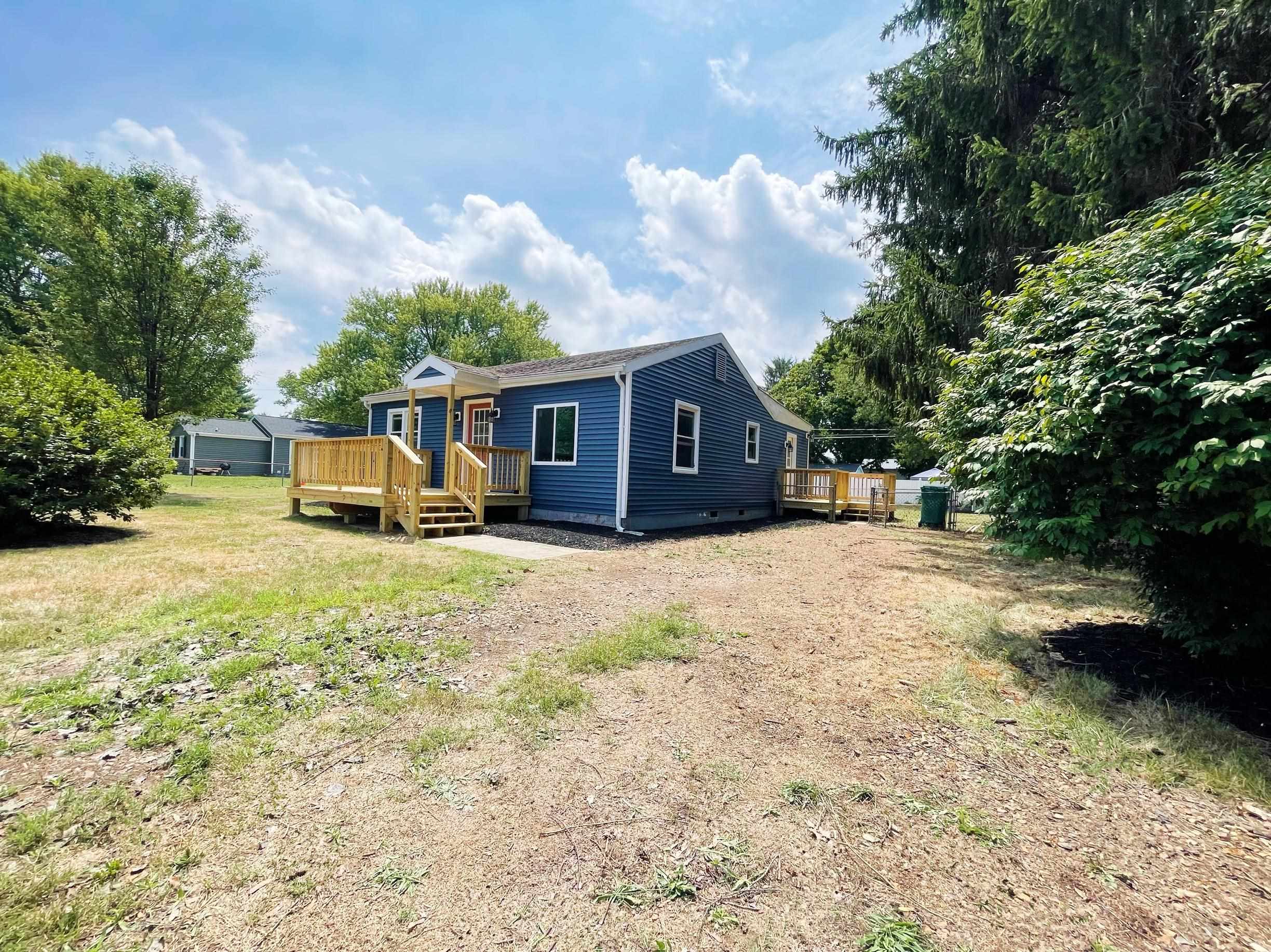 503 5th Street Grottoes, VA 24441 - Photo 2 of 24 a front view of house with yard and trees around