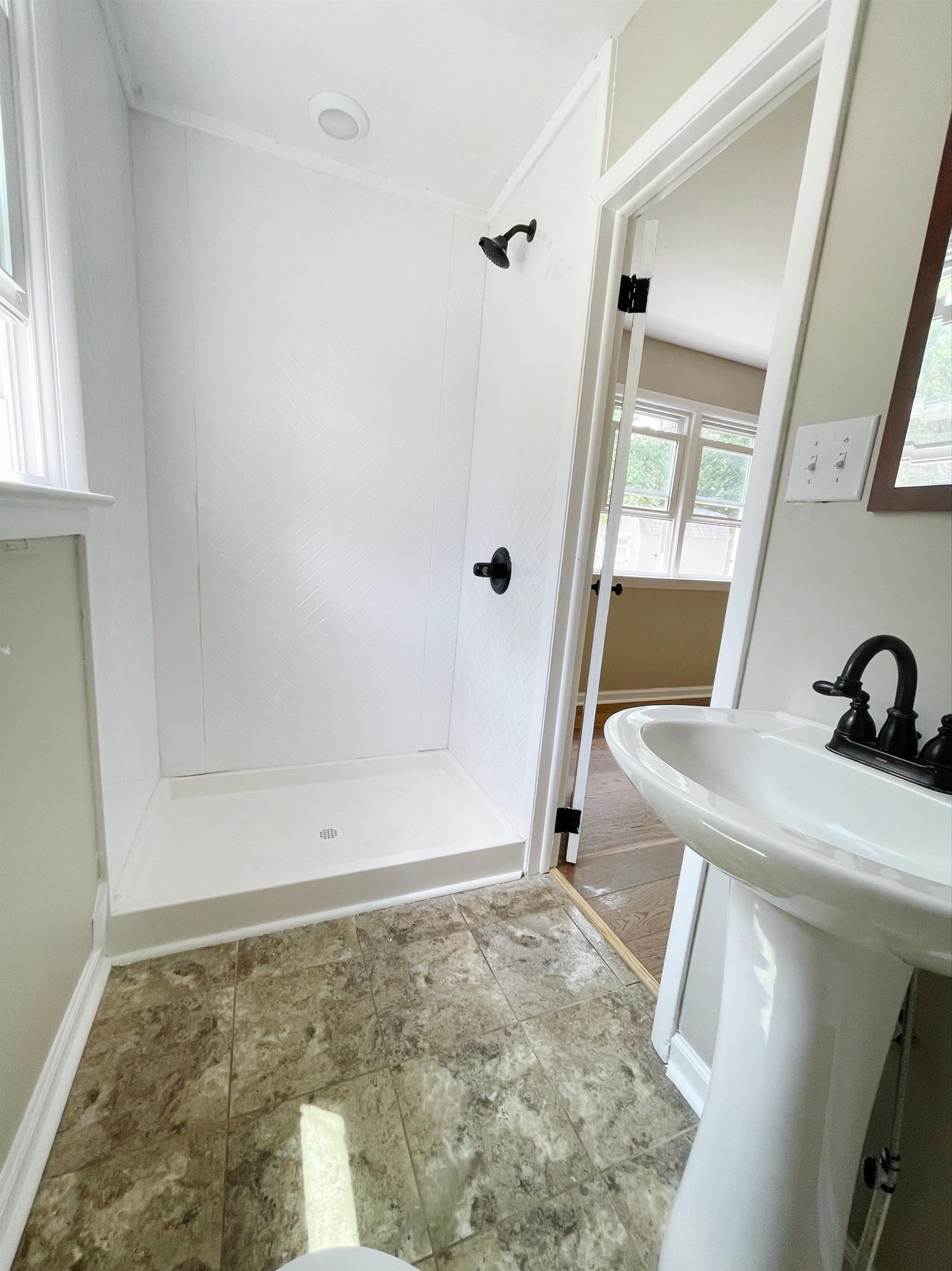 503 5th Street Grottoes, VA 24441 - Photo 21 of 24 a bathroom with a sink and a mirror