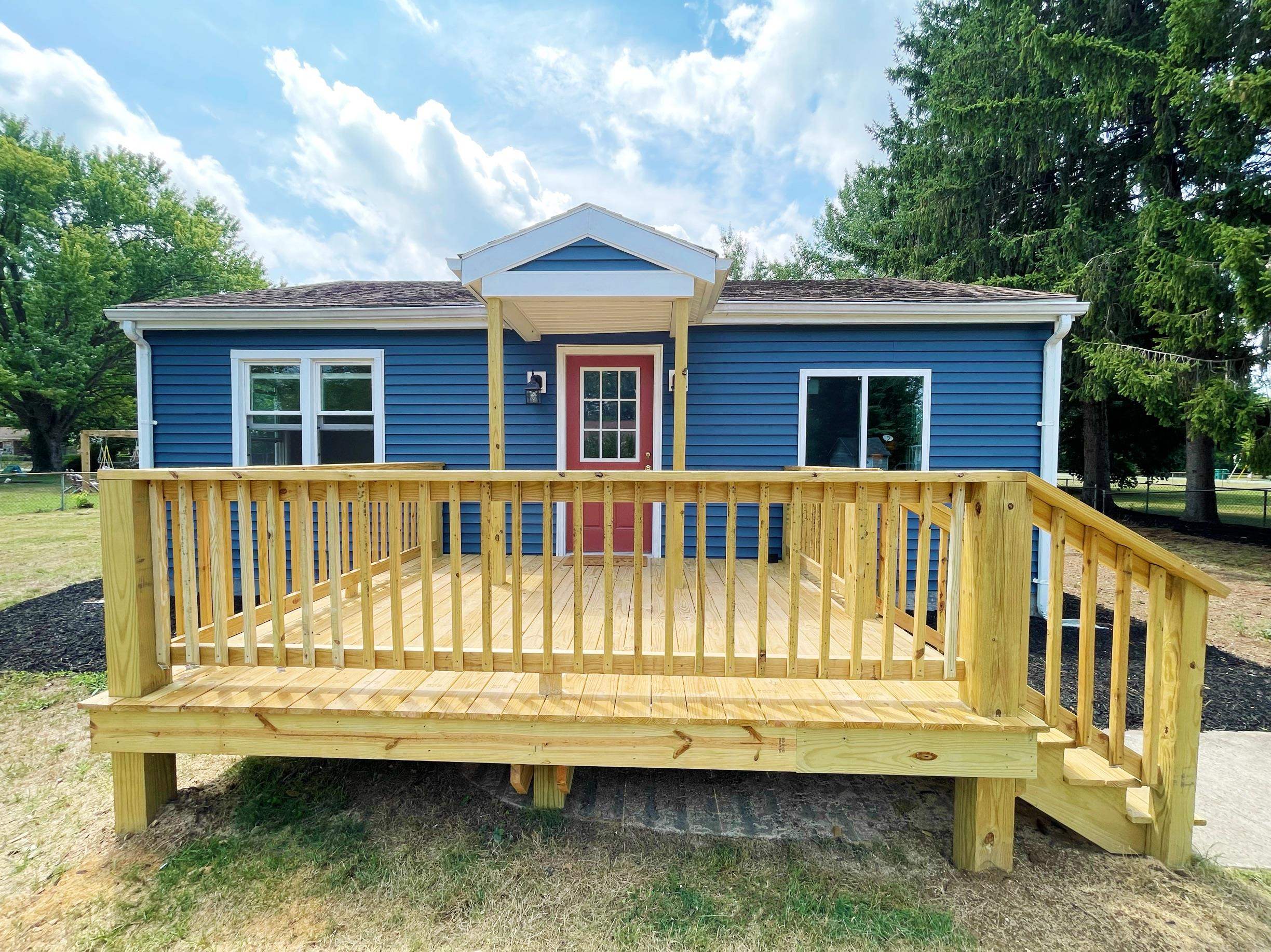 503 5th Street Grottoes, VA 24441 - Photo 9 of 24 a view of a house with a wooden deck