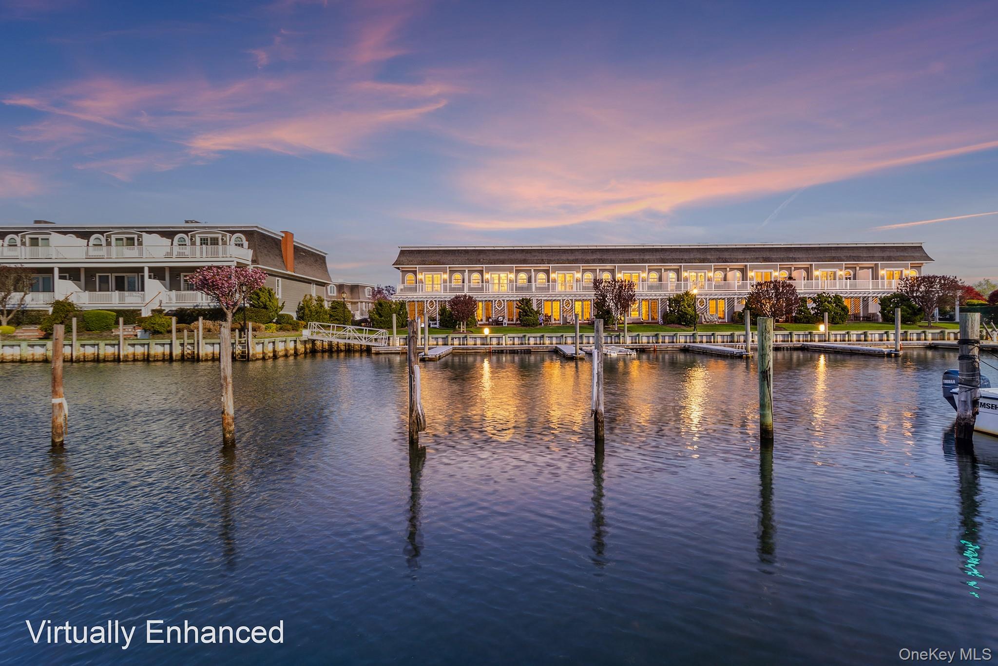 7 Salt Meadow Road, Unit 7 Babylon, NY 11702 - Photo 1 of 35 a view of a lake and a city