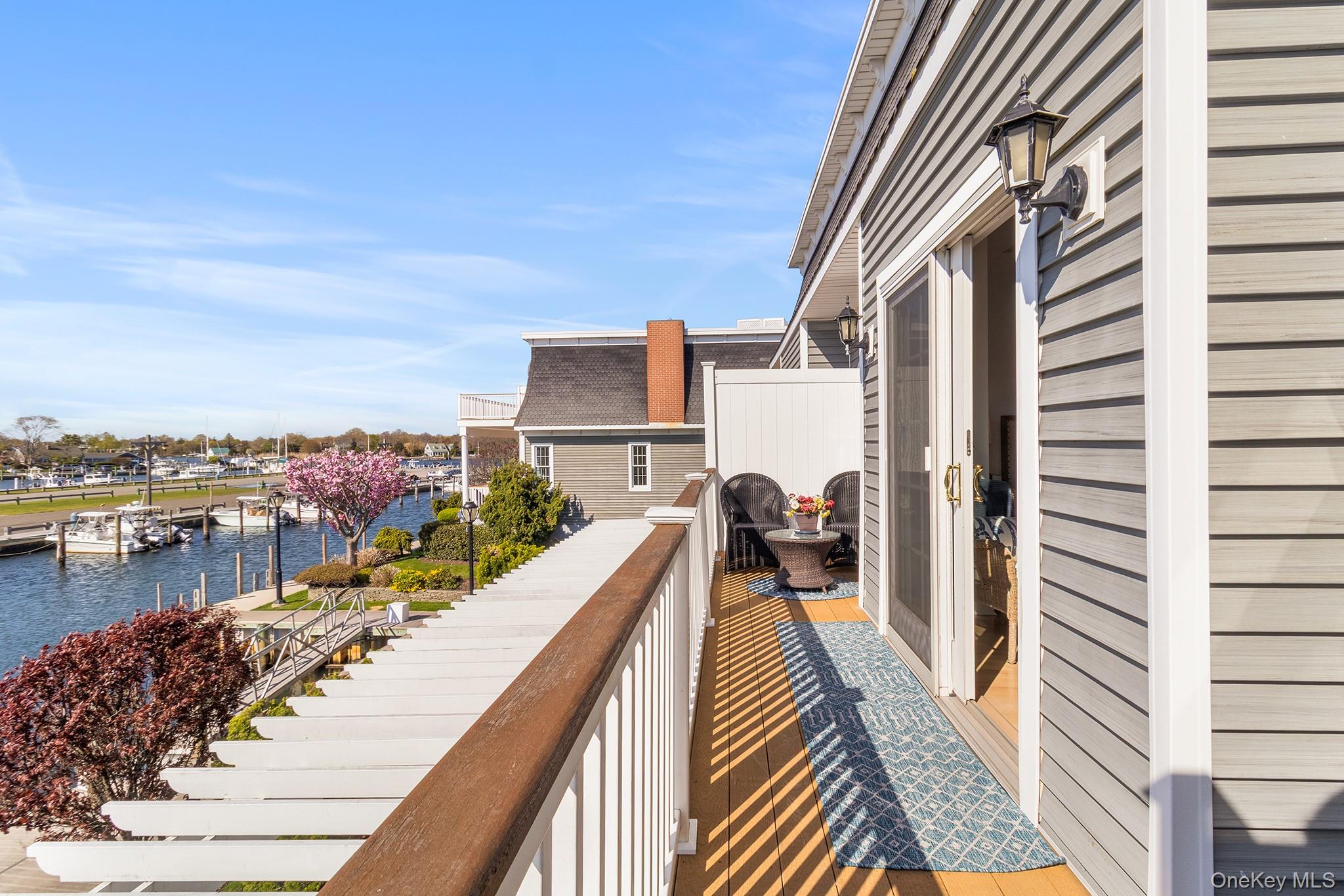 7 Salt Meadow Road, Unit 7 Babylon, NY 11702 - Photo 26 of 35 a view of balcony with couch