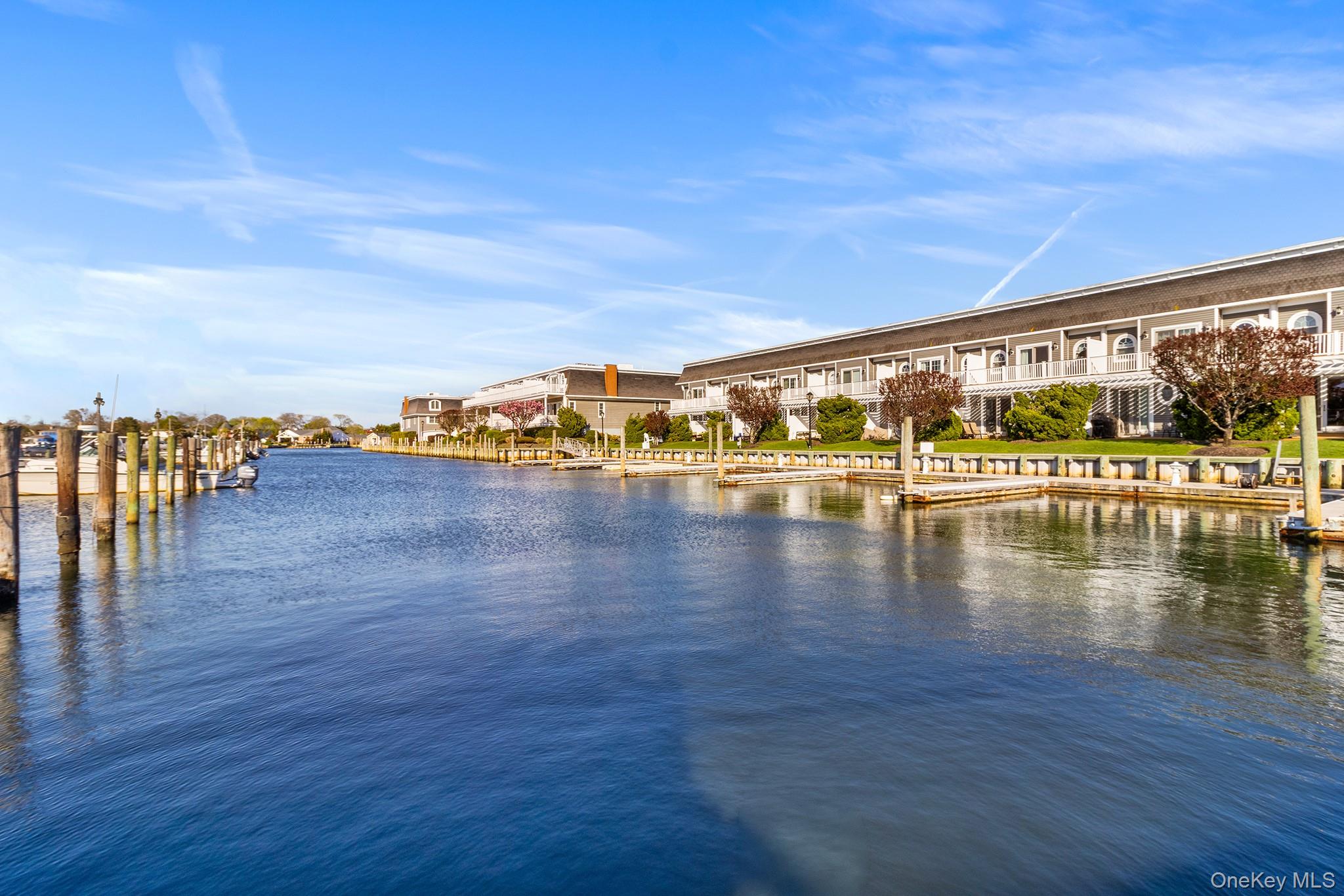 7 Salt Meadow Road, Unit 7 Babylon, NY 11702 - Photo 31 of 35 a view of an ocean with city