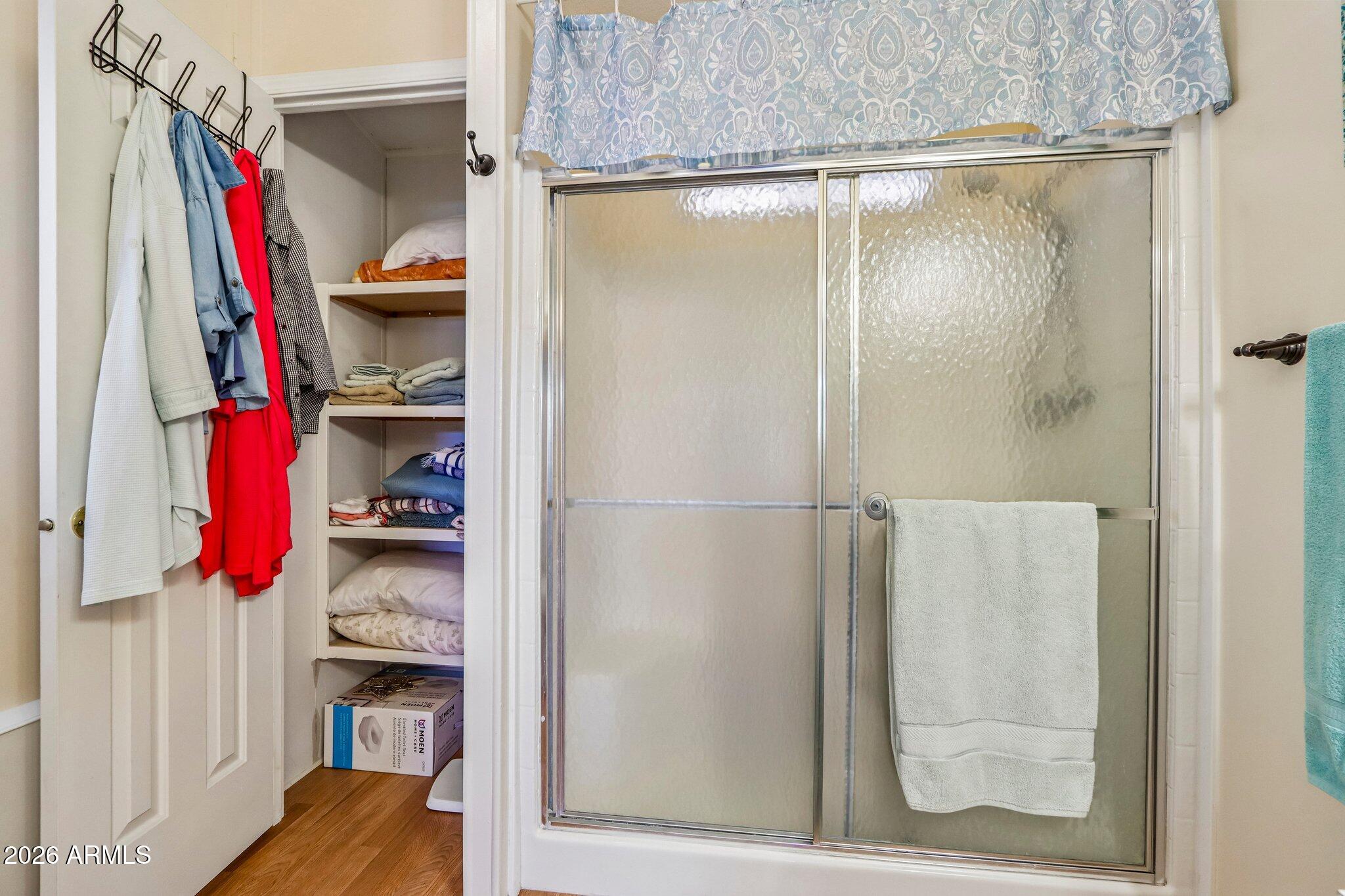 114 South Pinecrest Road Payson, AZ 85541 - Photo 21 of 40 a view of walk in closet with clothes and shoes