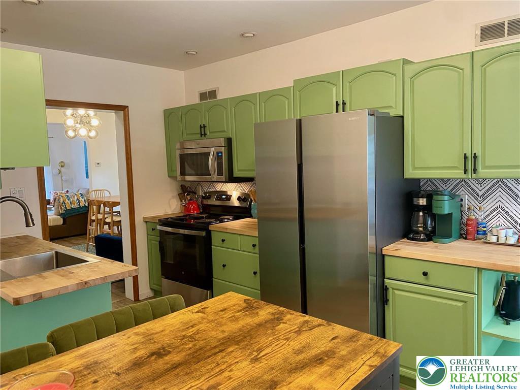 37 Evergreen Street Nazareth, PA 18064 - Photo 12 of 32 a kitchen with a refrigerator and a sink