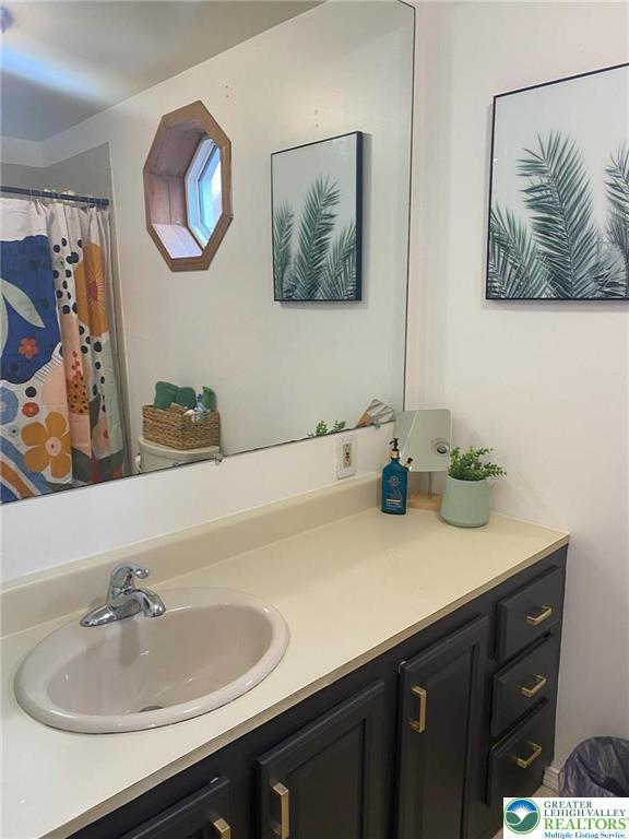 37 Evergreen Street Nazareth, PA 18064 - Photo 22 of 32 a bathroom with a sink and a mirror