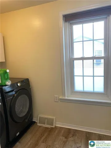a view of washer and dryer in a room