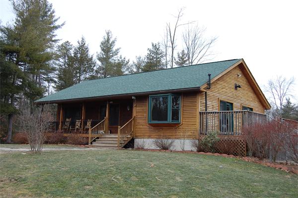 61 Coffey Hill Road Ware, MA 01082 - Photo 1 of 26 a view of a house with a yard