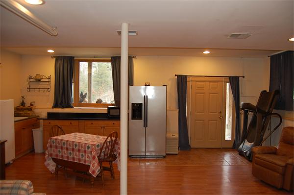 61 Coffey Hill Road Ware, MA 01082 - Photo 12 of 26 a living room with furniture and a window