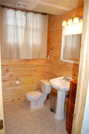 61 Coffey Hill Road Ware, MA 01082 - Photo 13 of 26 a bathroom with a sink a toilet and mirror