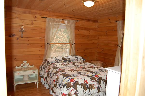 61 Coffey Hill Road Ware, MA 01082 - Photo 7 of 26 a bedroom with a bed and a window