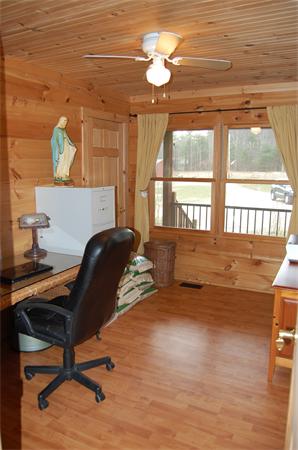 61 Coffey Hill Road Ware, MA 01082 - Photo 8 of 26 a view of a workspace with furniture and a window