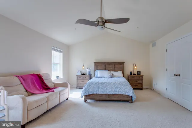 a bathroom with a tub and a sink