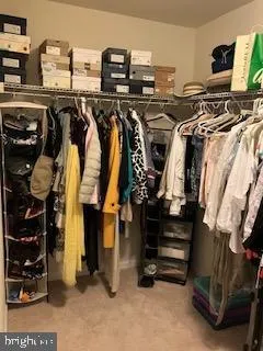 a bathroom with a sink toilet a mirror and shower