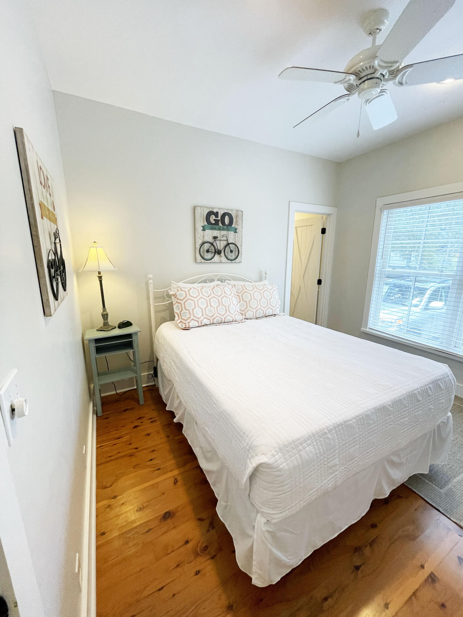 29 Olivia Lane Seacrest, FL 32461 - Photo 13 of 28 a bedroom with a bed and a window