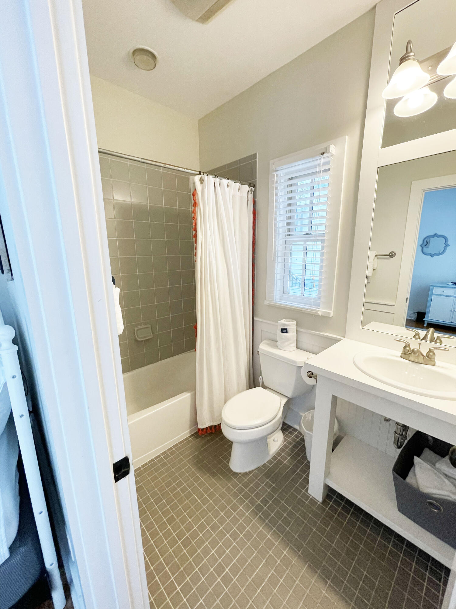 29 Olivia Lane Seacrest, FL 32461 - Photo 14 of 28 a bathroom with a sink a toilet a mirror and a tub