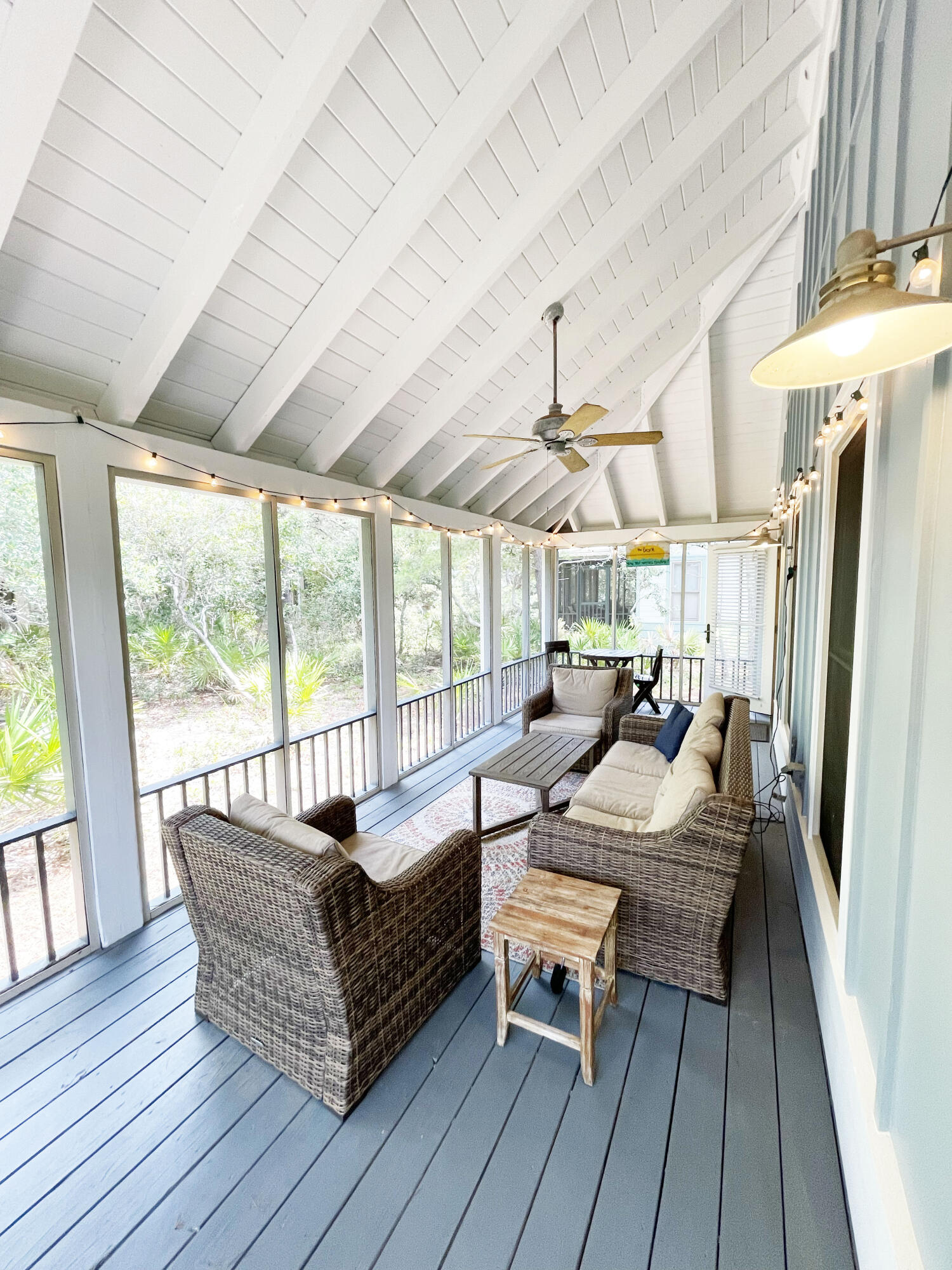 29 Olivia Lane Seacrest, FL 32461 - Photo 22 of 28 a living room with furniture and a large window