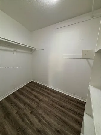 a view of small space with racks on the wall