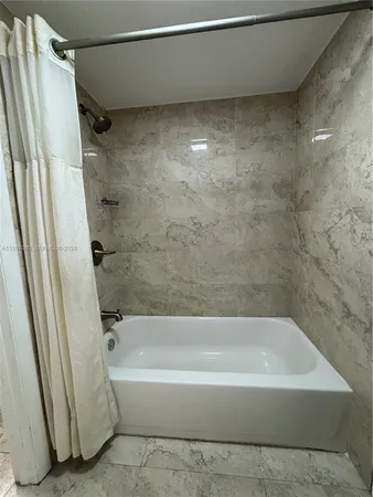 a bathroom with a bathtub