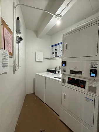 a view of house with backyard and seating space