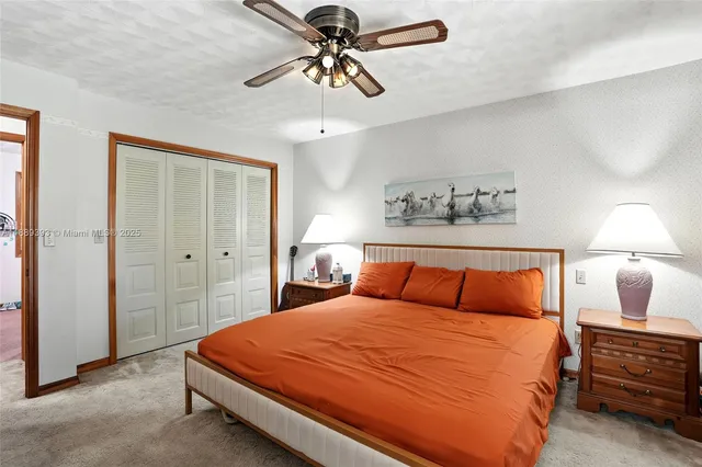 a bathroom with a sink vanity and a mirror