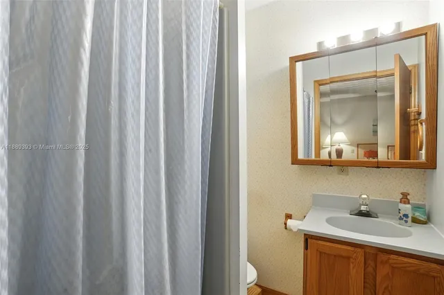 a view of room with toys and a large window