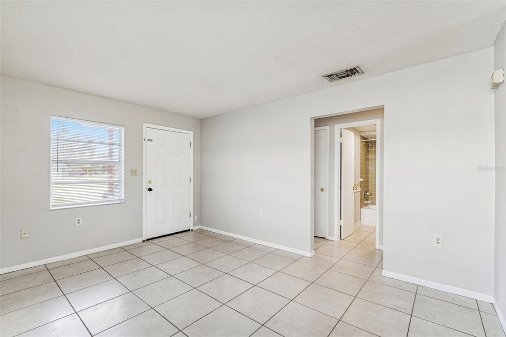 6026 Norton Road, Unit 6026 Lakeland, FL 33809 - Photo 15 of 17 a view of an empty room and window