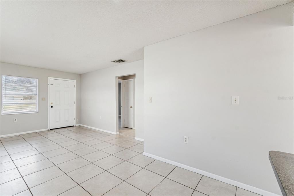 6026 Norton Road, Unit 6026 Lakeland, FL 33809 - Photo 16 of 17 a view of an empty room and window