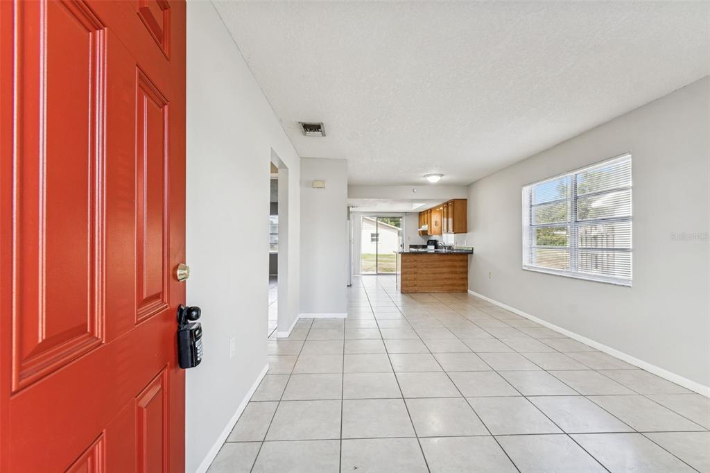 6026 Norton Road, Unit 6026 Lakeland, FL 33809 - Photo 5 of 17 a view of an empty room and window
