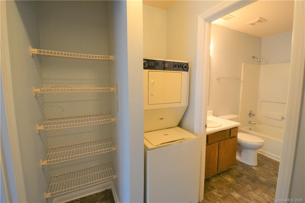 2343 Roland Drive, Unit F Monroe, NC 28110 - Photo 11 of 14 a bathroom with a toilet and a shower