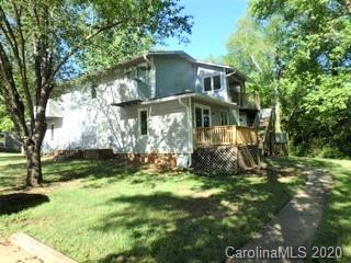 2343 Roland Drive, Unit F Monroe, NC 28110 - Photo 13 of 14 a view of house with a yard