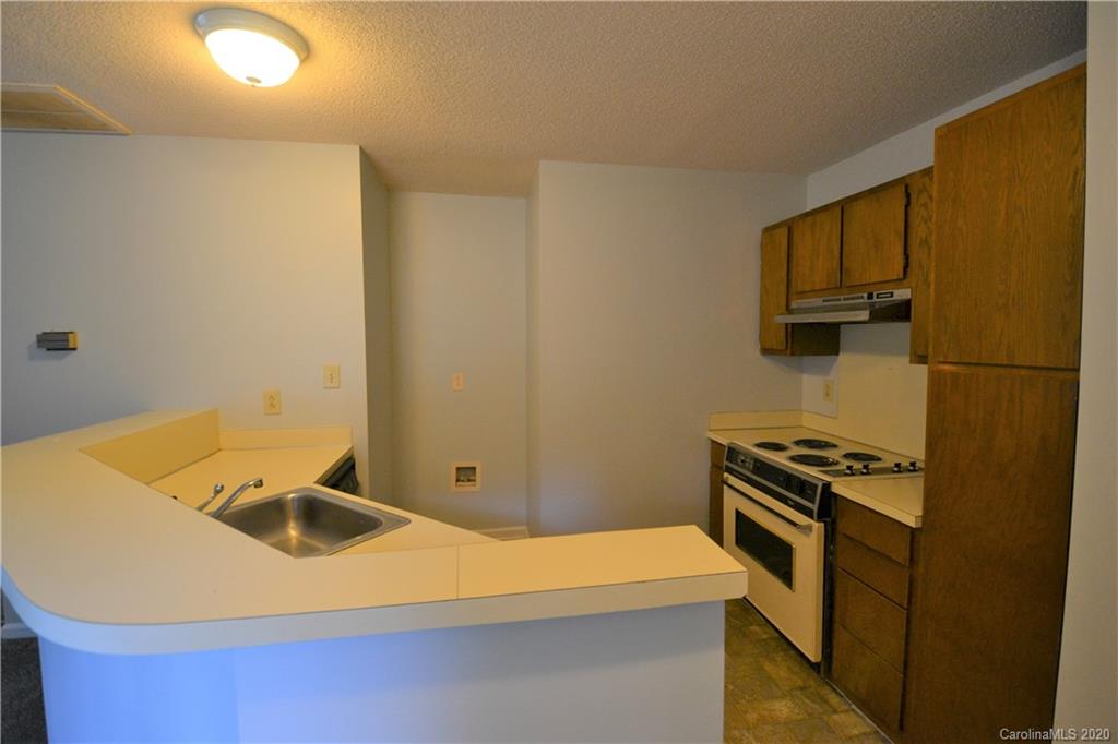 2343 Roland Drive, Unit F Monroe, NC 28110 - Photo 3 of 14 a room with storage and utility